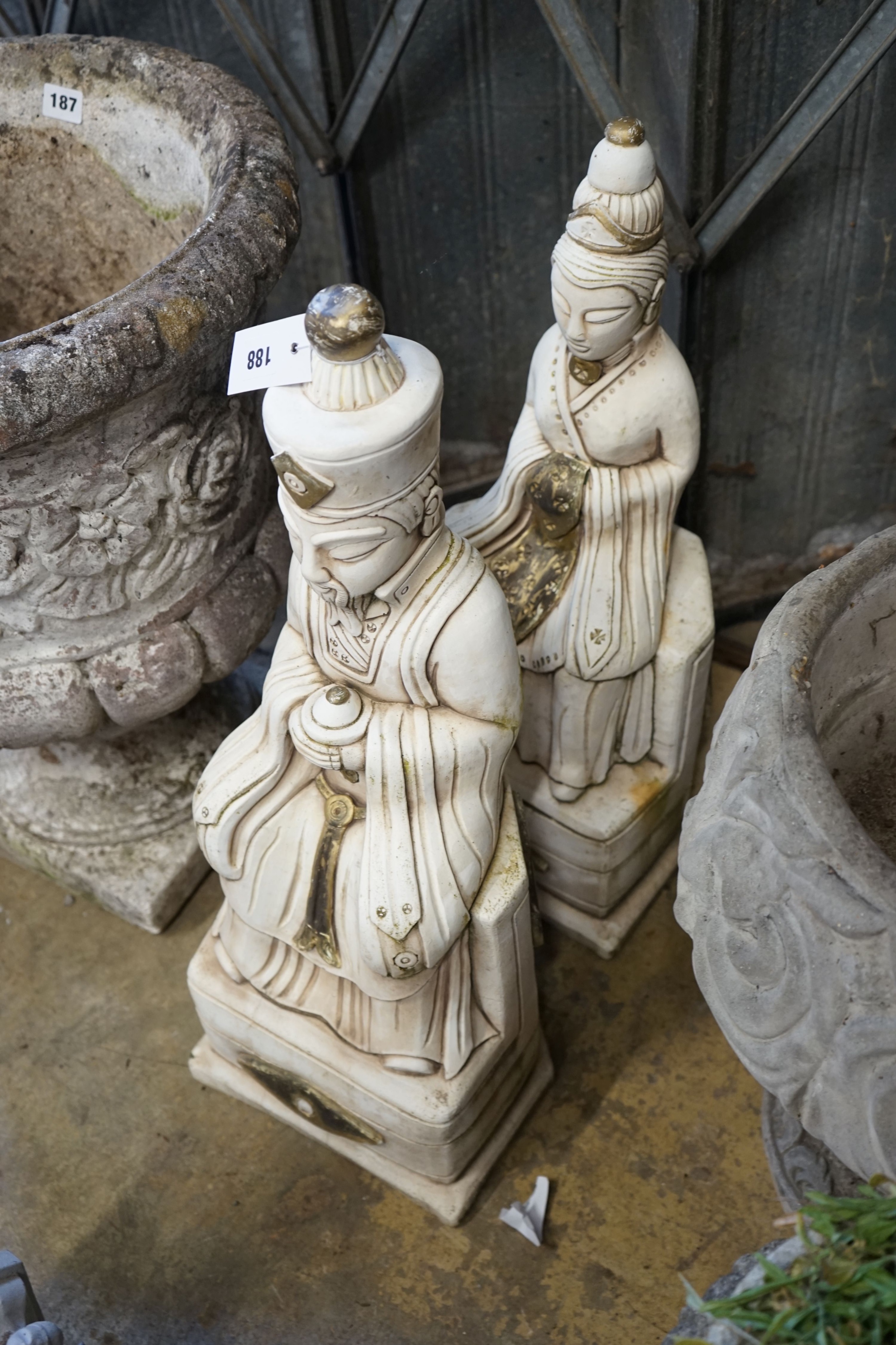 A pair of stone Buddha garden ornaments